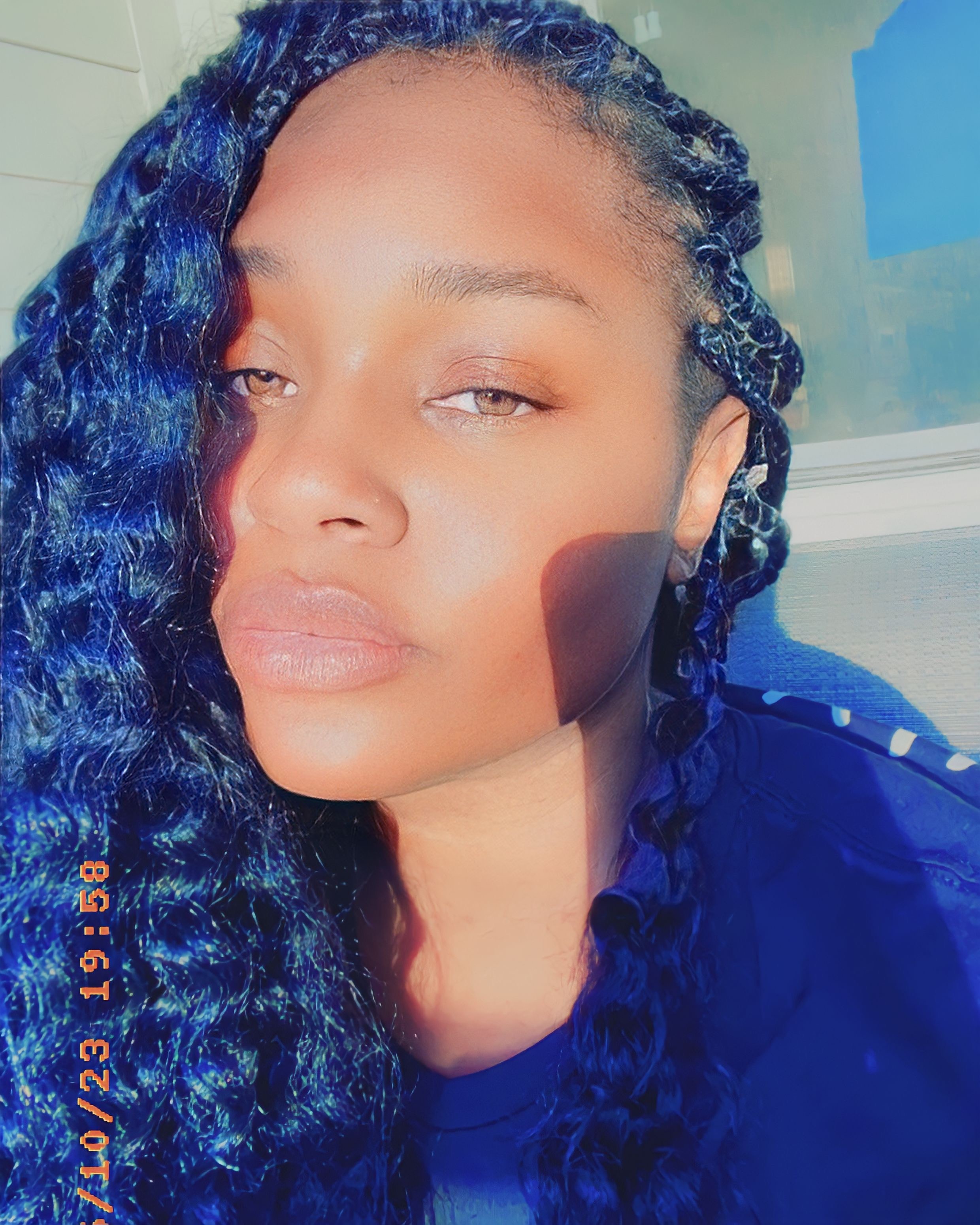 MIAMOR with blue braids